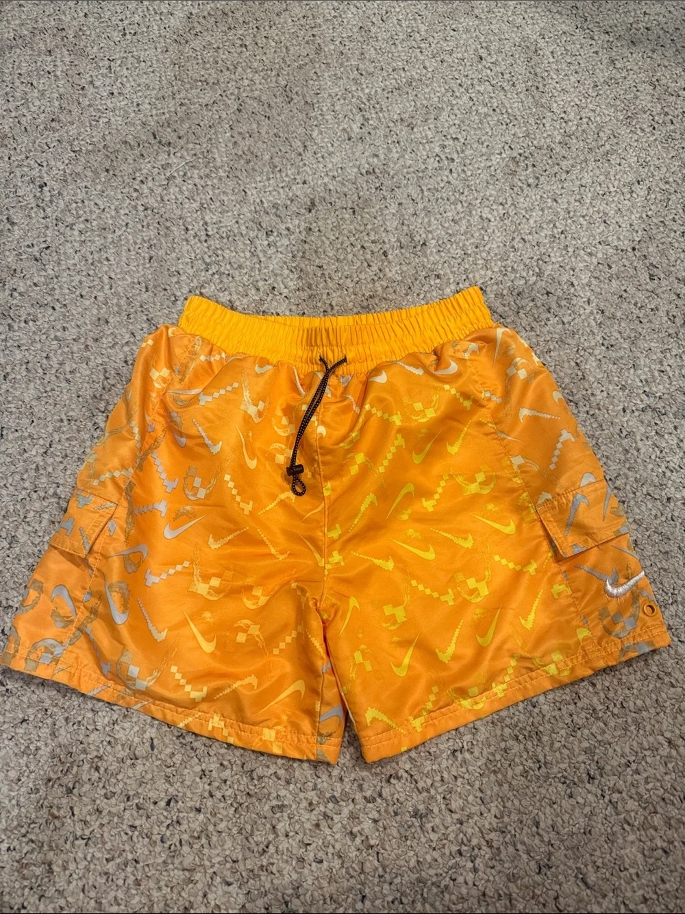 Nike Orange Kids' Swim Trunks with Graphic Swoosh Print